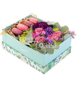 macarons with flowers in a box